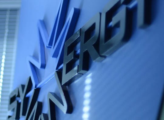 Symmergy-wallsign-crop Symmergy-wallsign-crop